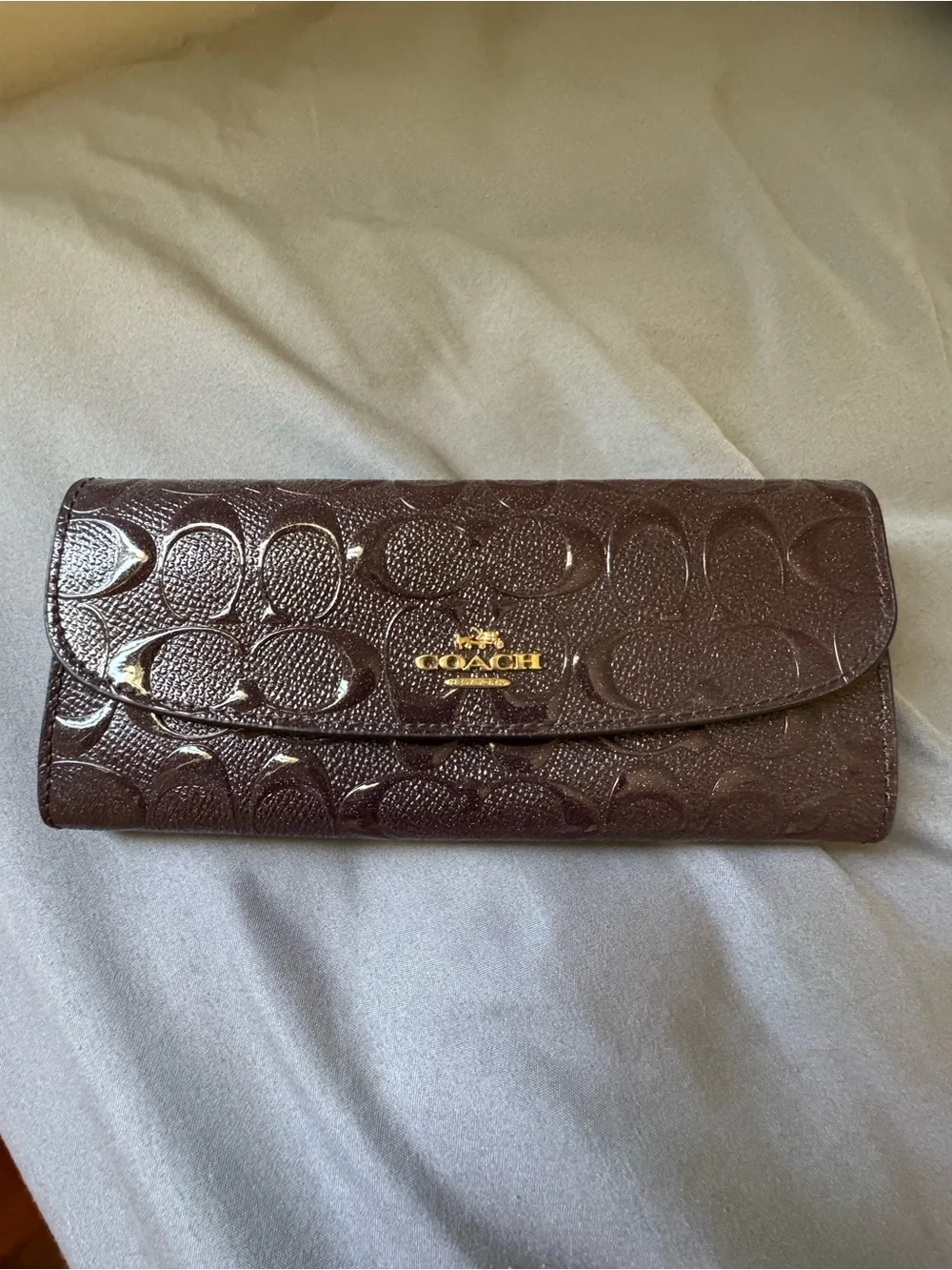 Coach plum signature glitter embossed wallet